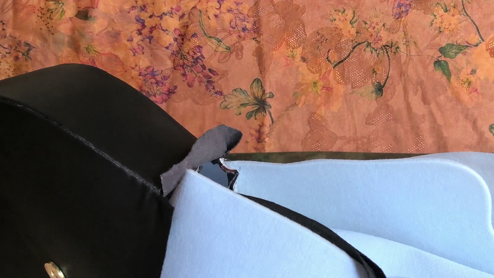 The assembled lining and outer shell are positioned together at the unfinished bag opening, with their stabilizer layers facing inward